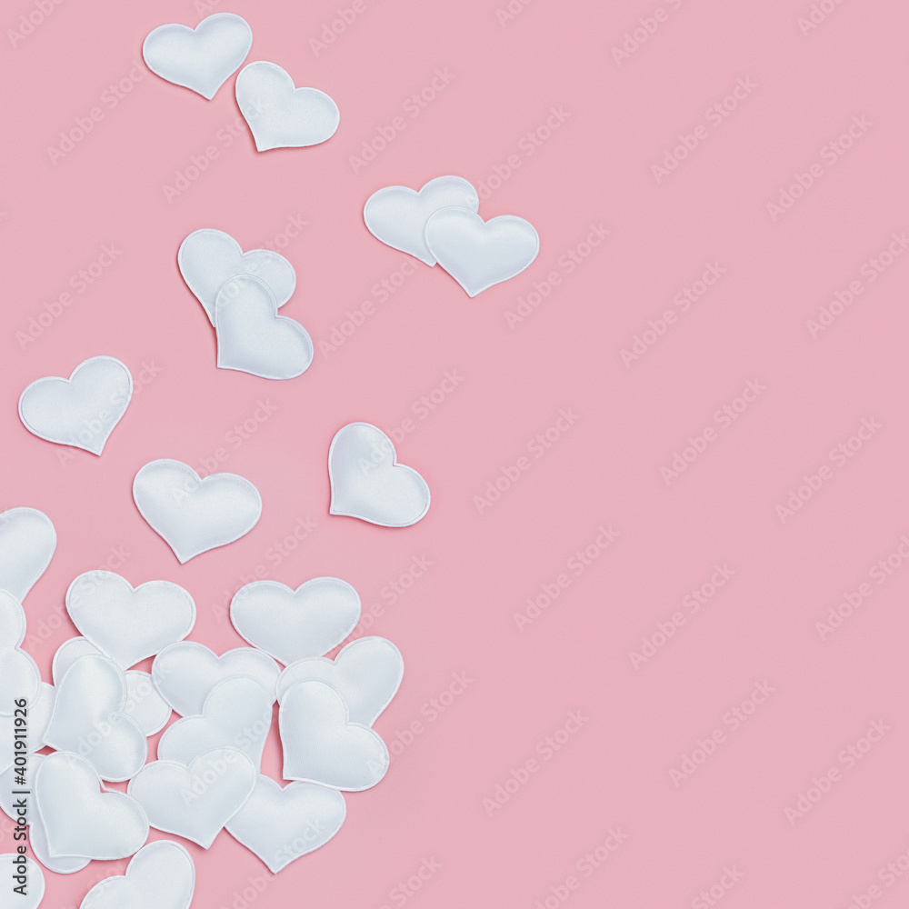 White hearts symbols of love on pink fon. Holiday background for Valentines Day. Love concept. Plain colored. Minimal style.