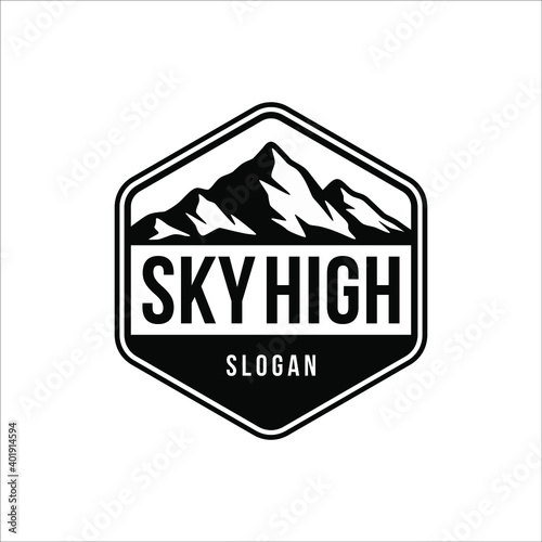 Mountain with elegant curves and retro badge