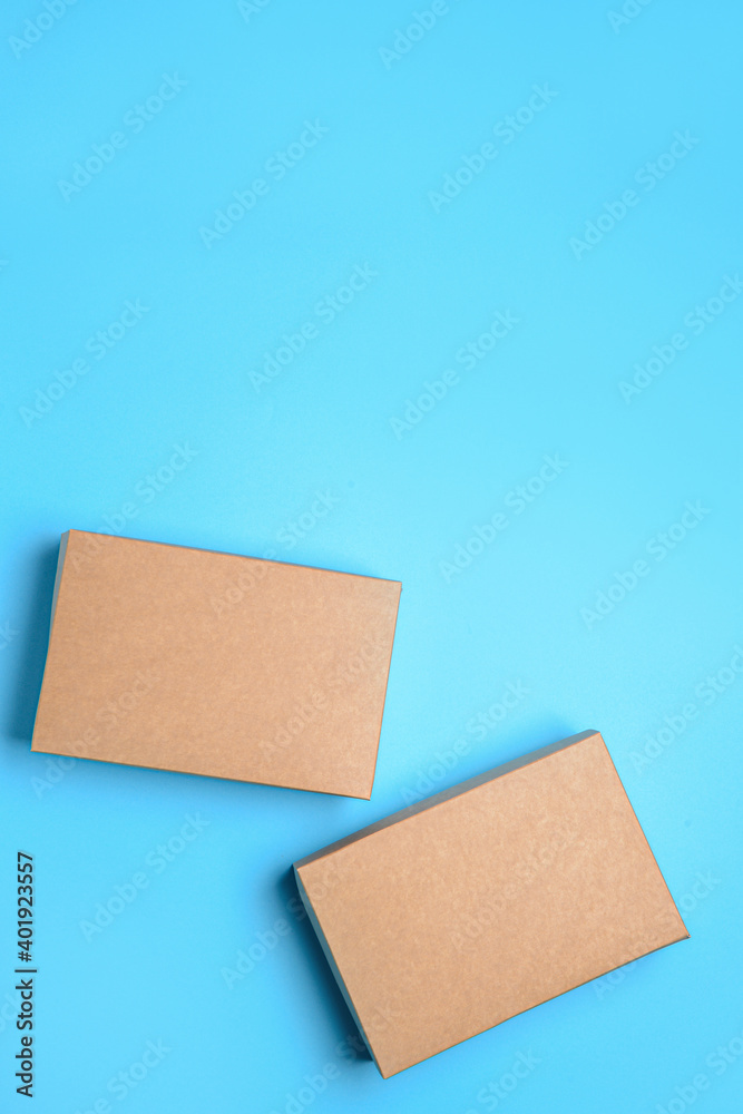 Blank cardboard boxes on color background Blank cardboard boxes on color background
