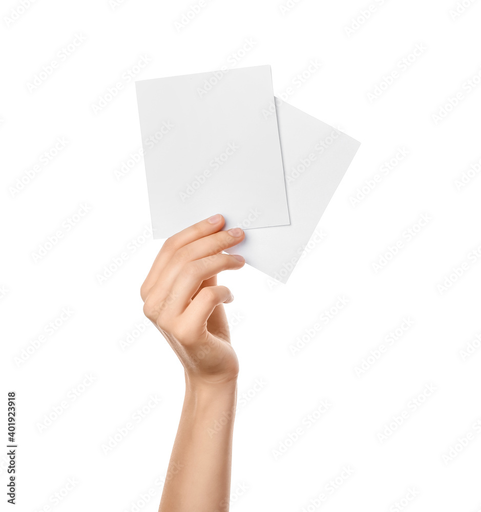 Female hand with blank paper on white background Female hand with blank paper on white background