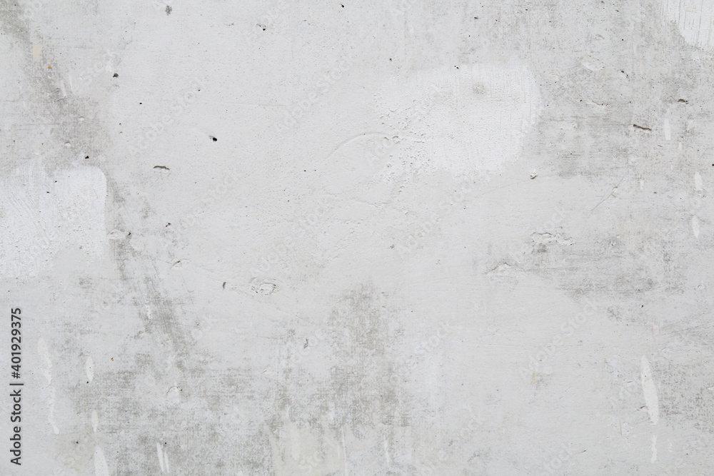 Fototapeta premium Gray concrete wall peeled of wallpaper. Concrete background.