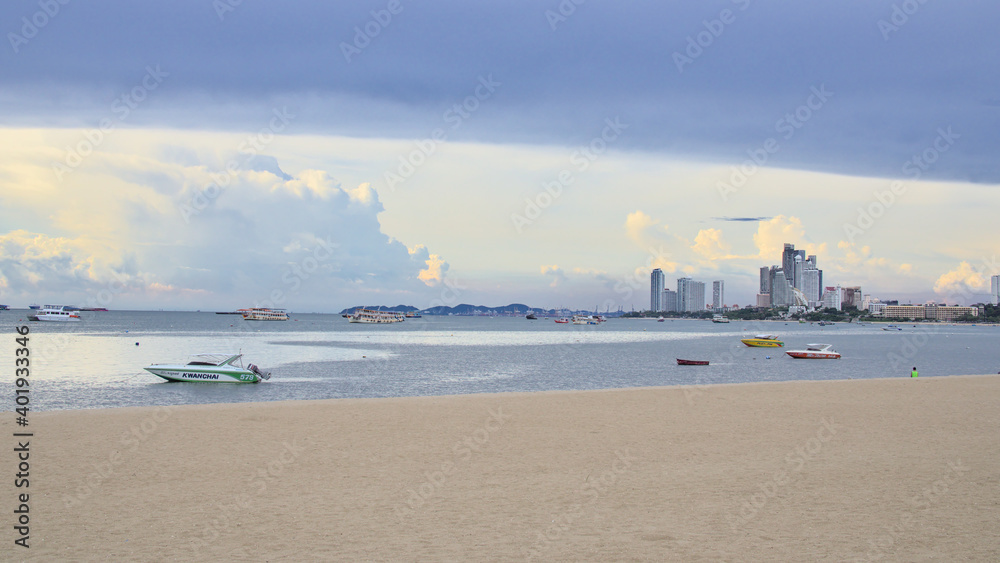A scenic view of the famous  Pattaya white sand beach in Thailand. 