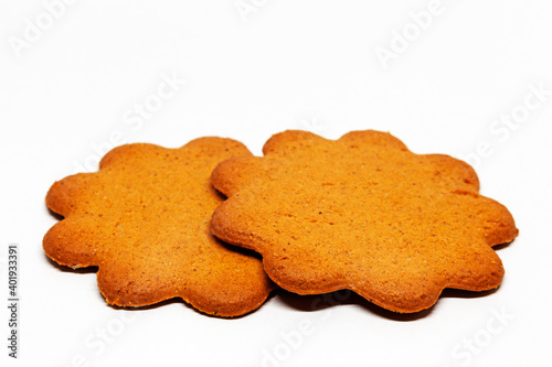 two gingerbread cookies on white background