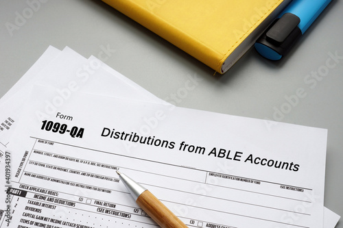  Financial concept about Form 1099-QA Distributions from ABLE Accounts with phrase on the piece of paper.