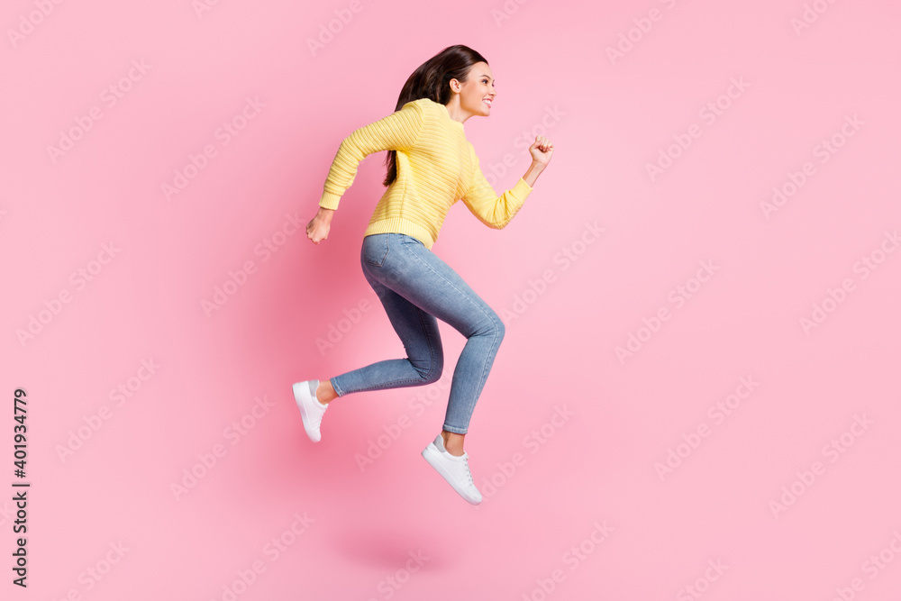 Profile side full size photo of young beautiful smiling good mood jump fly run go walk isolated on pink color background