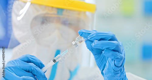 researcher making a vaccination