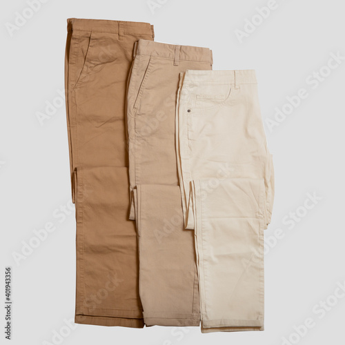 Set of men's clothes on a light background.