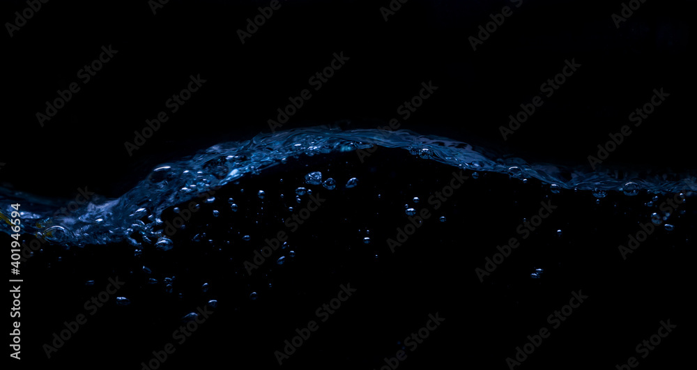 A wave on a black background