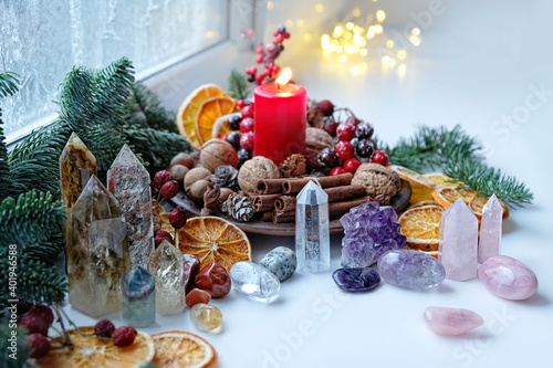 Bilde på lerret Gemstones crystals, candle and natural winter decor