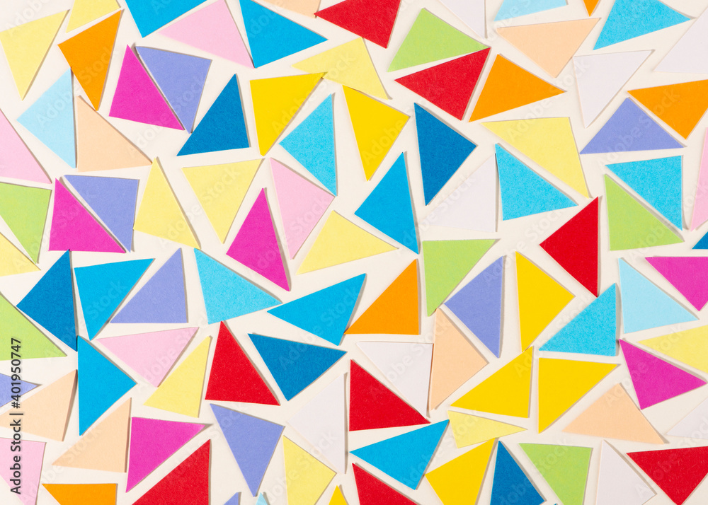 Colorful paper mosaic on light background. Abstract wallpaper. Geometric background.