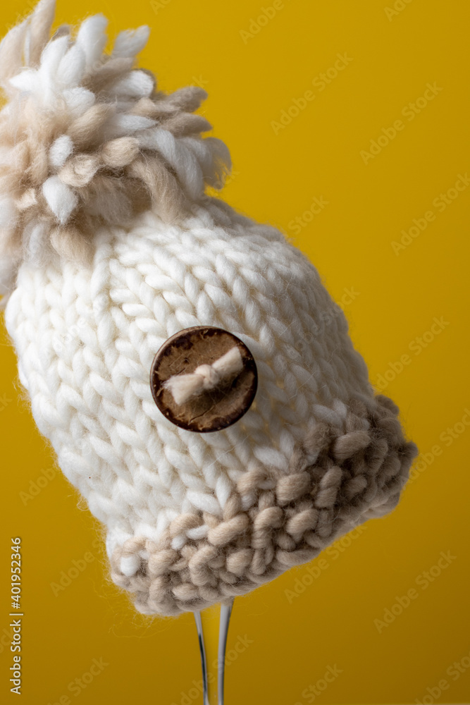 Obraz premium warm and cosy hand made pompom hat 