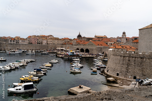 An aerial shot of boats in the harb in Dubrovnik in Croatia photo