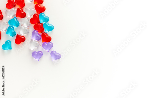 .Concept of small multi-colored glass hearts