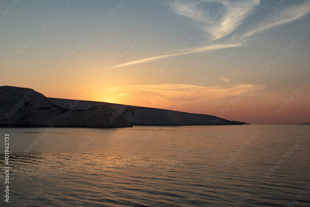 View on Adriatic sea in Croatia with sunset on the way to Pag.