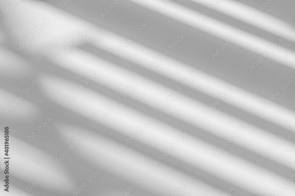 Abstract shadow and striped diagonal light background on white wall from window, architecture dark gray and sunshine diagonal geometric effect overlay for backdrop and mockup design Abstract shadow and striped diagonal light background on white wall from window, architecture dark gray and sunshine diagonal geometric effect overlay for backdrop and mockup design