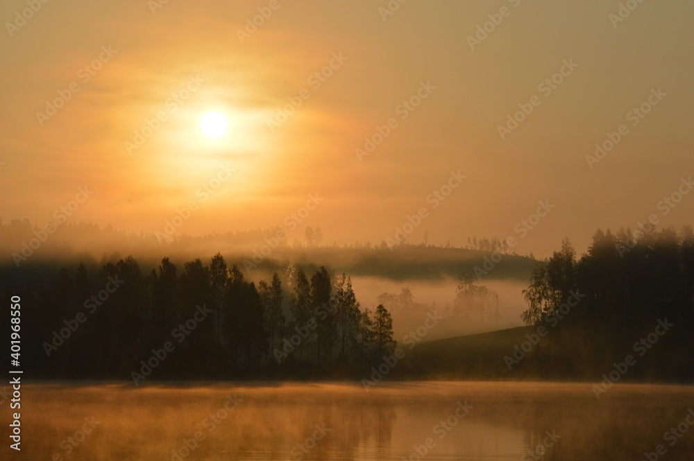 morning mist over the lake in Finland