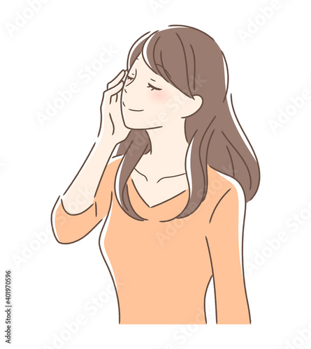 頬を抑えてしっとりした表情の女性