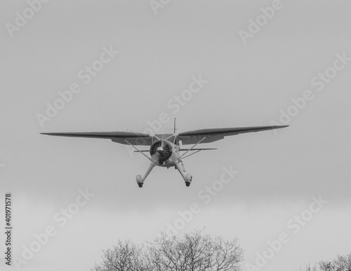 Картината върху платно Vintage monoplane transport aircraft in monochrome.