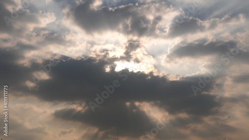 Beautiful sun light behind dark cloud