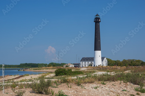  View to the Sõrve lighthouse in Saaremaa island, Estonia, on hot and hazy summer day.  © Ilga