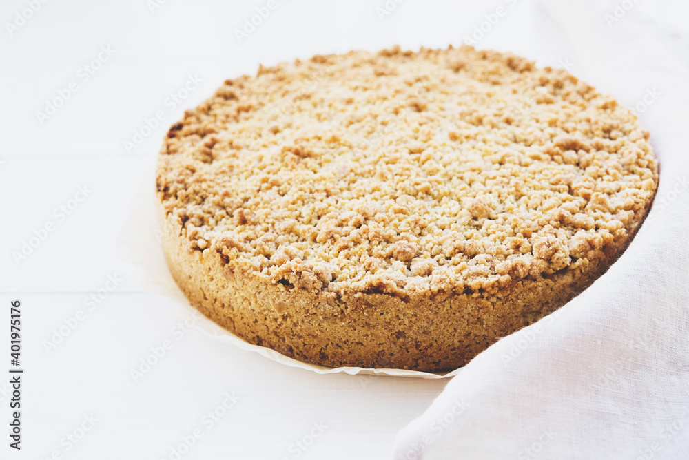 Freshly baked homemade double crutsed apple crumb pie on white background. Sweet food. Freshly baked homemade double crutsed apple crumb pie on white background. Sweet food.