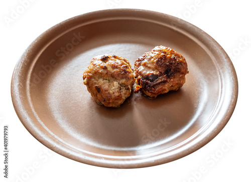 fried russian Kotleta (minced beef steak) on brown plate cut out on white background