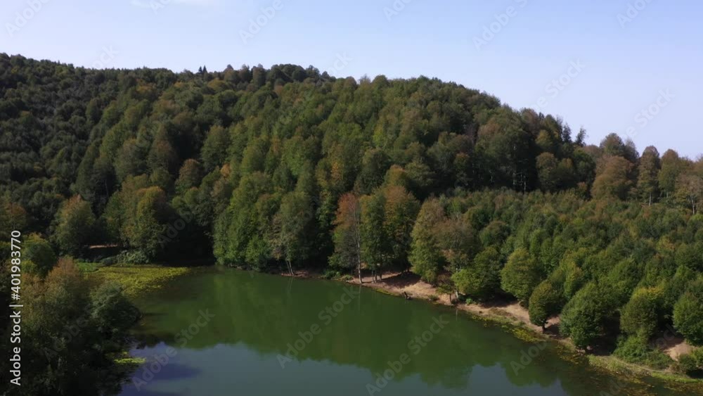 A panoramic video of Hendek Golyaka Kemerli Yaylasi. There is a lake that is placed in the middle of a forest. A panoramic video of Hendek Golyaka Kemerli Yaylasi. There is a lake that is placed in the middle of a forest.