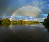 double rainbow over river