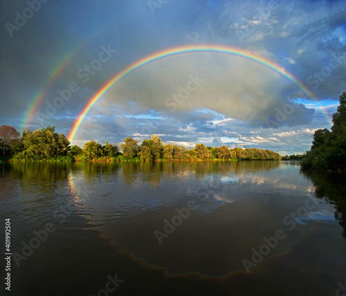 double rainbow over river