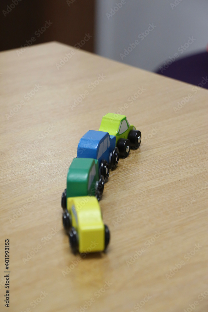 Fototapeta premium Toy cars on the table