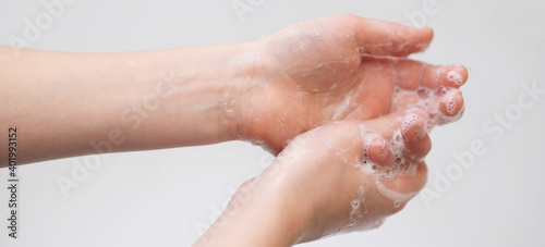 baby hands in foam, hand hygiene