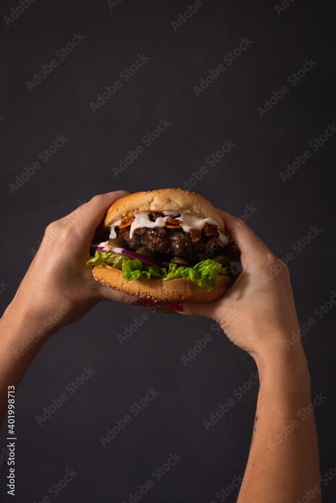 burger in hand