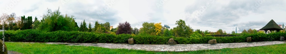 Park in spring - panoramic view, flowers Park in spring - panoramic view, flowers