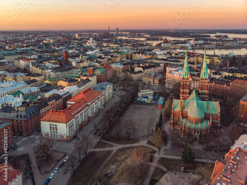 Aerial view of Helsinki Church and the city during a sunset and on a summer evening