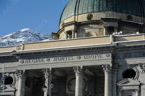 veduta della basilica superiore di oropa in ambiente innevato photo