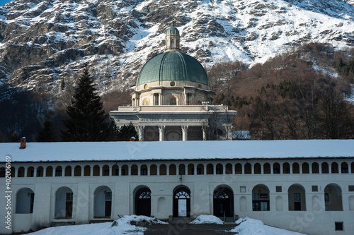 viata della basilica nuova di oropa e di parte del chiostro del santuarioin ambiente innevato photo