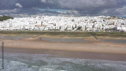 Atlantic ocean shore at the Beach of los Bateles in Conil de la Frontera aerial drone view photo