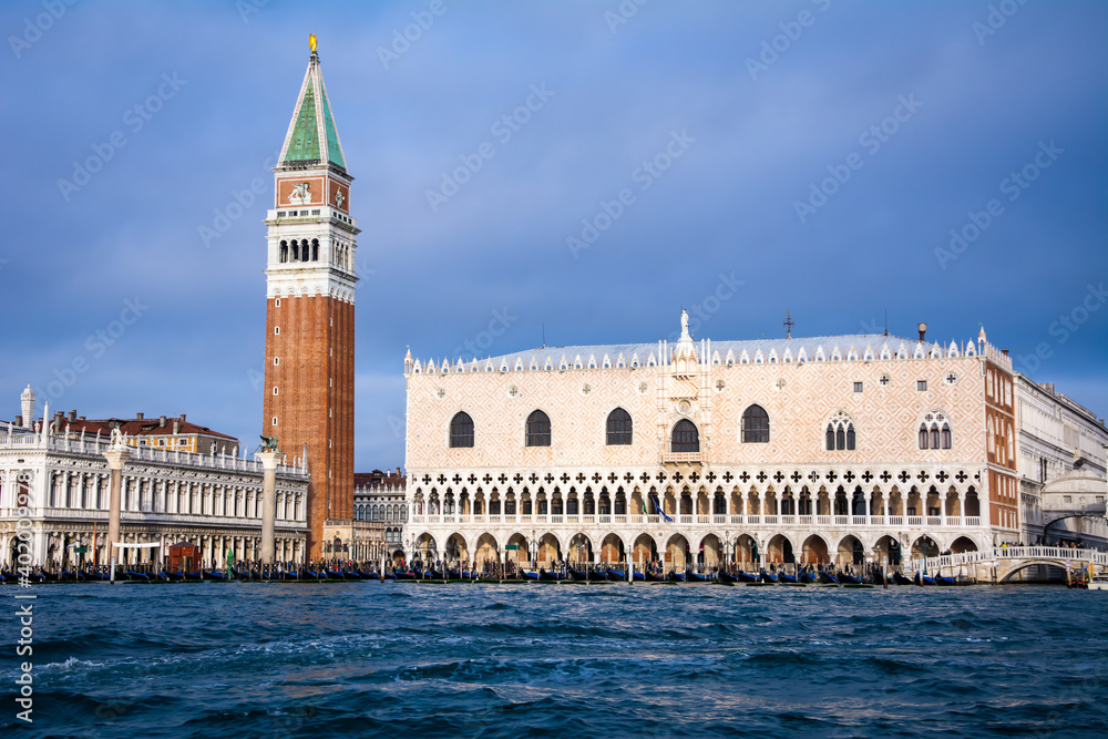 Venice landmark, view from the sea of Piazza San Marco or st Mark square, Campanile and Ducale or Doge Palace. Italy, Europe.
