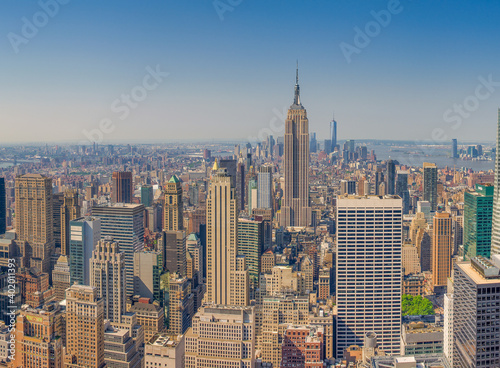 NEW YORK CITY - JUNE 10, 2013: Panoramic aerial view of Manhattan from a city rooftop at sunset © jovannig