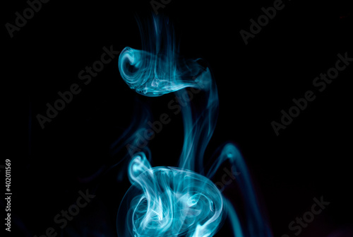 Sculpting abstract shape with incense smoke