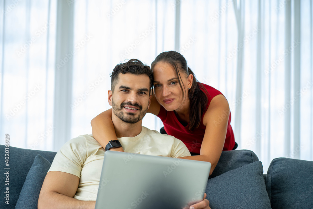 Caucasian couple lovers work from home new normal with computer laptop notebook Caucasian couple lovers work from home new normal with computer laptop notebook