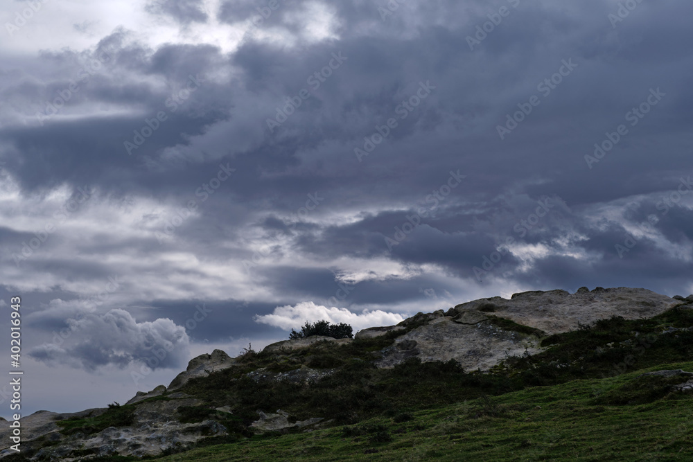 Mountain landscape with stormy clouds