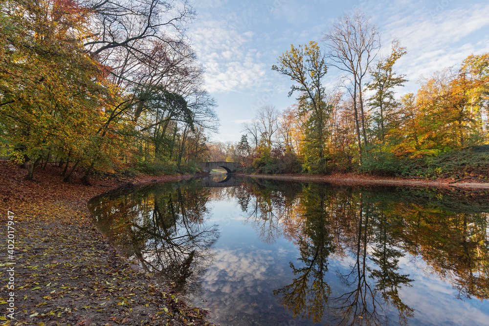 Fototapeta premium Krefeld - View to Bridge at City Lake in autumn mood in the early morning / Germany