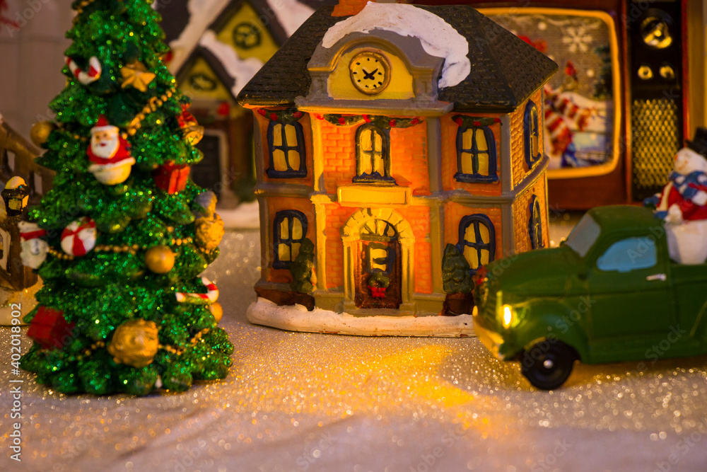Christmas toy city, house, snow, light, toys and decorations Christmas toy city, house, snow, light, toys and decorations