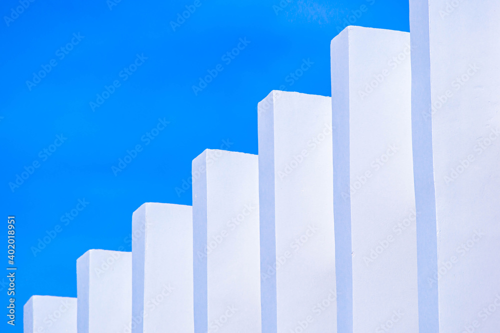White concrete pillars with blue sky background. White concrete pillars with blue sky background.