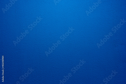 Abstract grunge decor. Beautiful dark blue stucco wall background. Space for designing and inserting text.