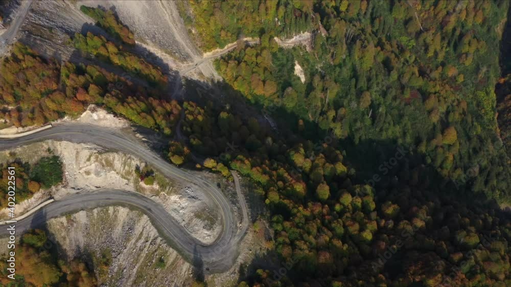 A unique view of the road landscape adorned with trees is seen in this photo taken from the hill with a drone. A unique view of the road landscape adorned with trees is seen in this photo taken from the hill with a drone.