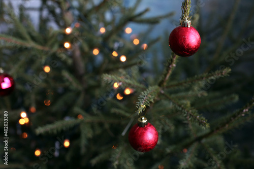 Background with lights of garland and christmas tree decorations
