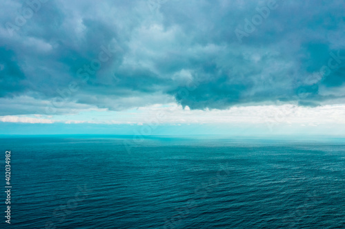 Sea and clouds, storm background, waves on water.