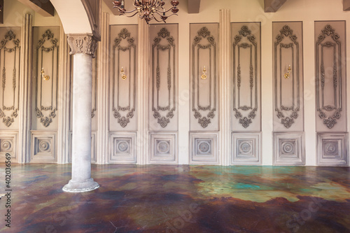 Luxury old custle interior. Large hall with columnes. beautiful furniture stylized baroque style photo